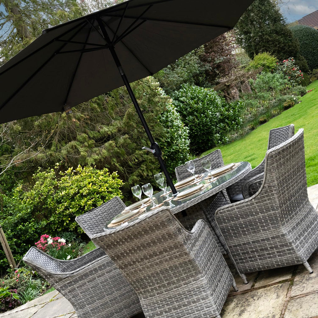 Tintagel 6 Seat Aluminium Grey Rattan 135cm Dining Table Set - Dark Grey Cushions